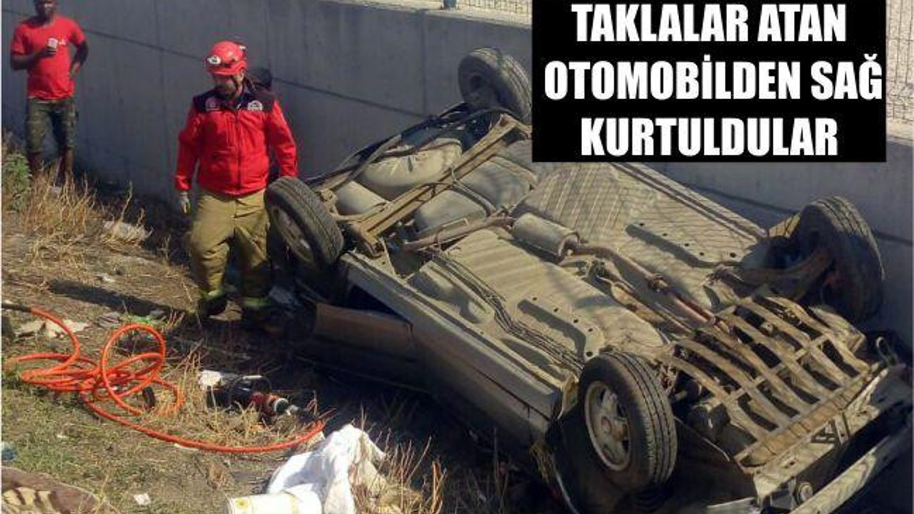 Taklalar atan otomobilden sağ kurtuldular