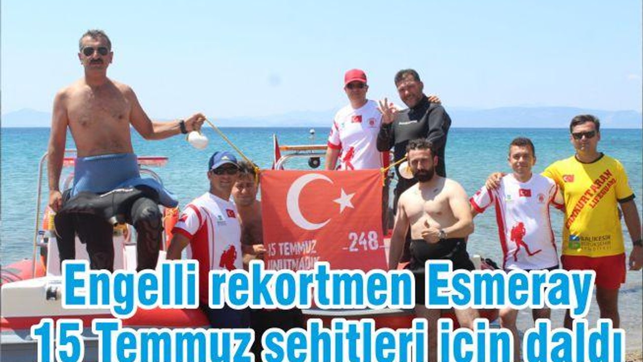 Engelli rekortmen Esmeray 15 Temmuz şehitleri için daldı