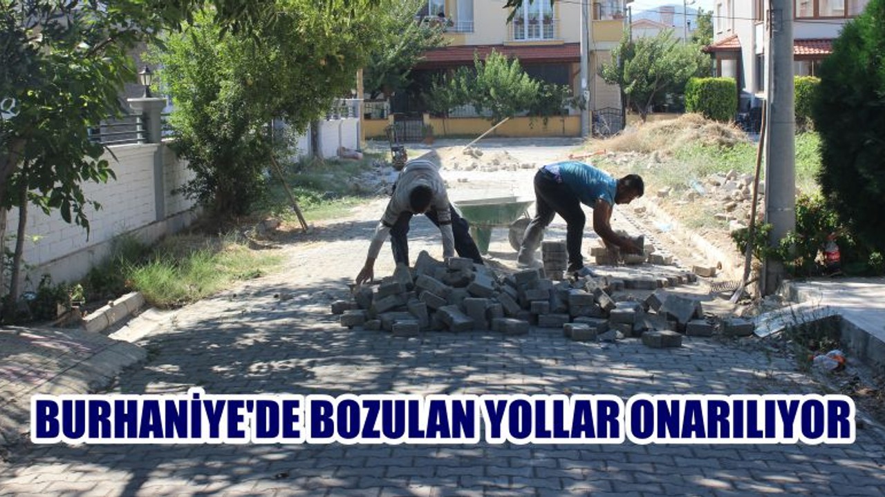 BURHANİYE’DE BOZULAN YOLLAR ONARILIYOR
