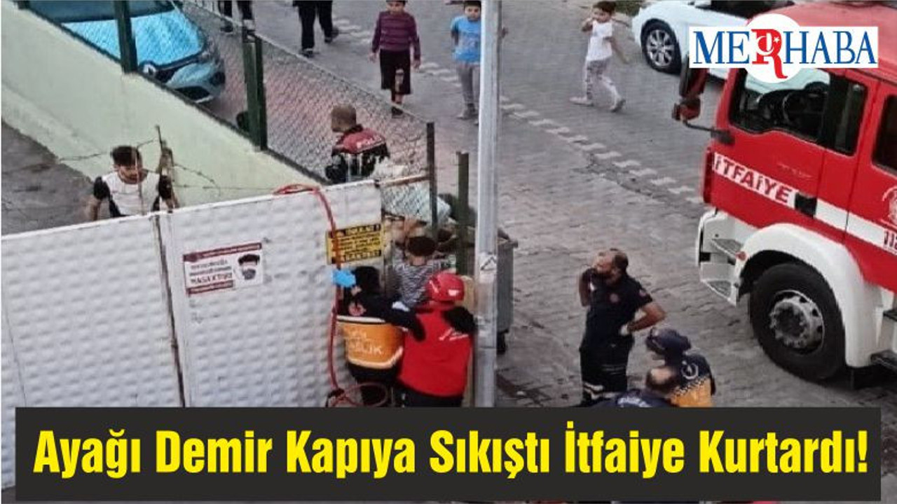 Ayağı Demir Kapıya Sıkıştı İtfaiye Kurtardı!