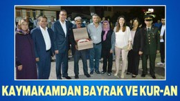 KAYMAKAMDAN BAYRAK VE KUR-AN