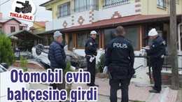 Otomobil evin bahçesine girdi