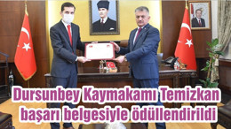 Dursunbey Kaymakamı Temizkan, başarı belgesiyle ödüllendirildi