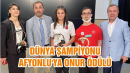 DÜNYA ŞAMPİYONU AFYONLU'YA ONUR ÖDÜLÜ