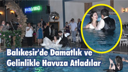 Balıkesir’de Damatlık ve Gelinlikle Havuza Atladılar