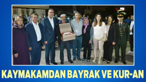 KAYMAKAMDAN BAYRAK VE KUR-AN