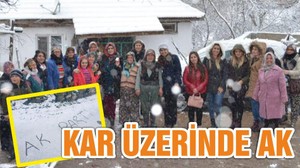 KAR ÜZERİNDE AK