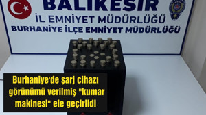 Burhaniye'de şarj cihazı görünümü verilmiş "kumar makinesi" ele geçirildi