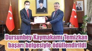 Dursunbey Kaymakamı Temizkan, başarı belgesiyle ödüllendirildi