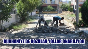 BURHANİYE’DE BOZULAN YOLLAR ONARILIYOR
