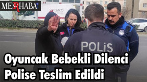 Oyuncak Bebekli Dilenci Polise Teslim Edildi
