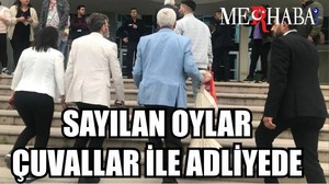 Sayılan oylar çuvallar ile adliyeye getiriliyor