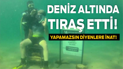 Müşterisini denizin altında tıraş etti