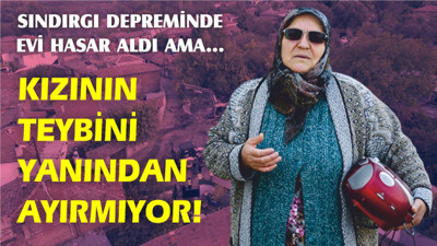 Sındırgı'daki depremde evi hasar gören kadın kızının hediyesi teybi yanından ayırmıyor