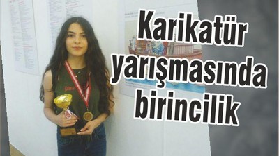 KARİKATÜR YARIŞMASINDA BİRİNCİLİK