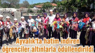 Ayvalık'ta hatim indiren öğrenciler altınlarla ödüllendirildi