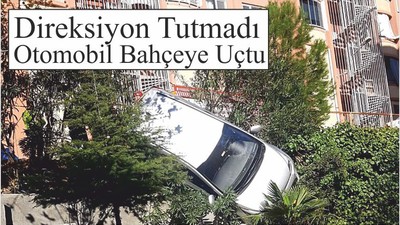 Balıkesir'de Direksiyon Tutmadı ,Otomobil Bahçeye Uçtu