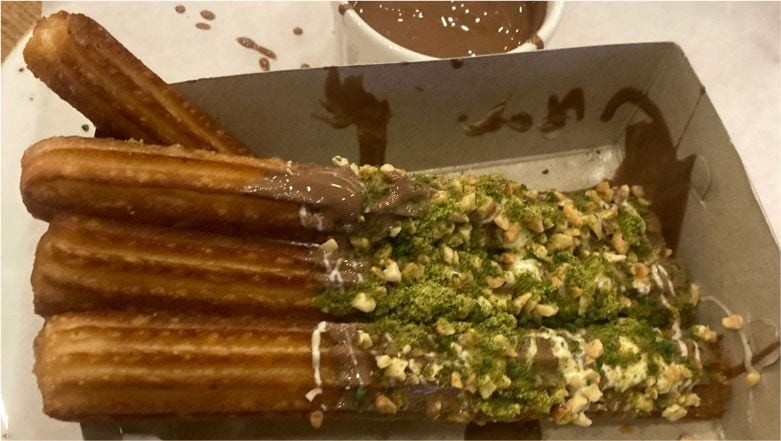 Churros ve Sütlü Kahve Bu İki lezzetin mükemmel birleşimi Churros ve Sütlü Kahve: Tatlı ve Lezzet Dolu Bir Kombinasyon