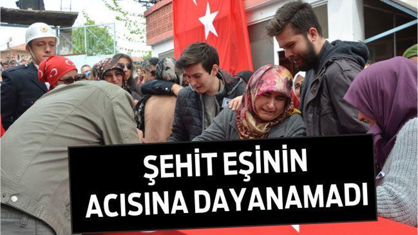 Şehit eşinin acısına dayanamadı