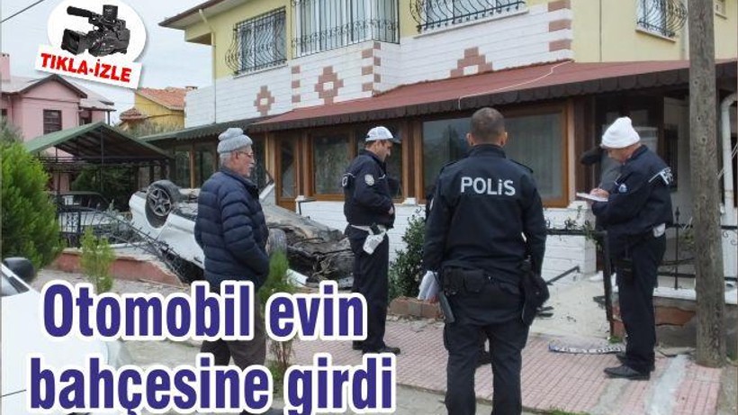 Otomobil evin bahçesine girdi